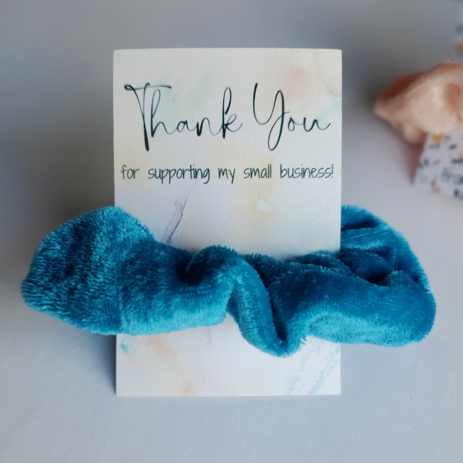 Thank you for supporting my small business card with multi colored marbling and a blue scrunchie wrapped round the card- confetti drop shop